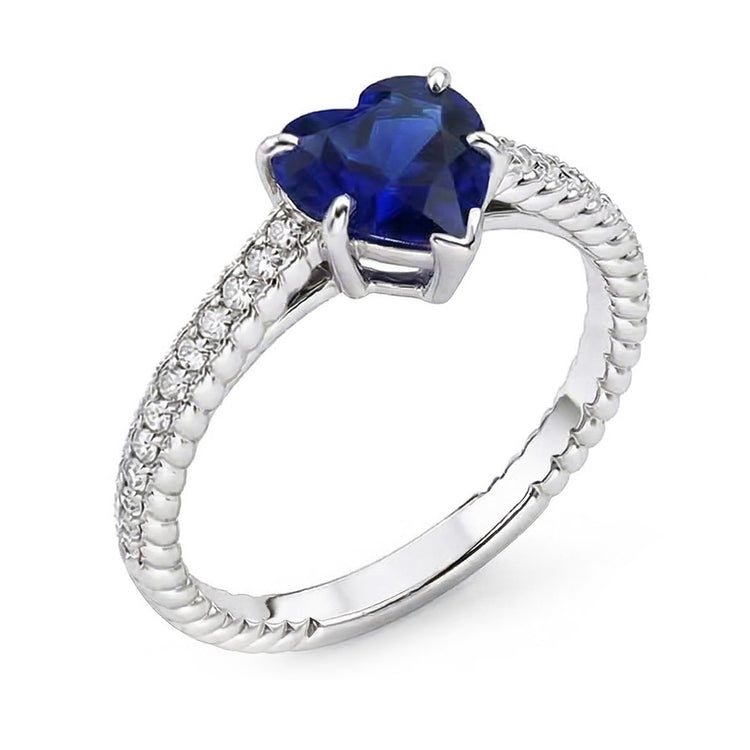 Bague solitaire en saphir de Ceylan et serti pavé. accents de diamants 2.50 carats