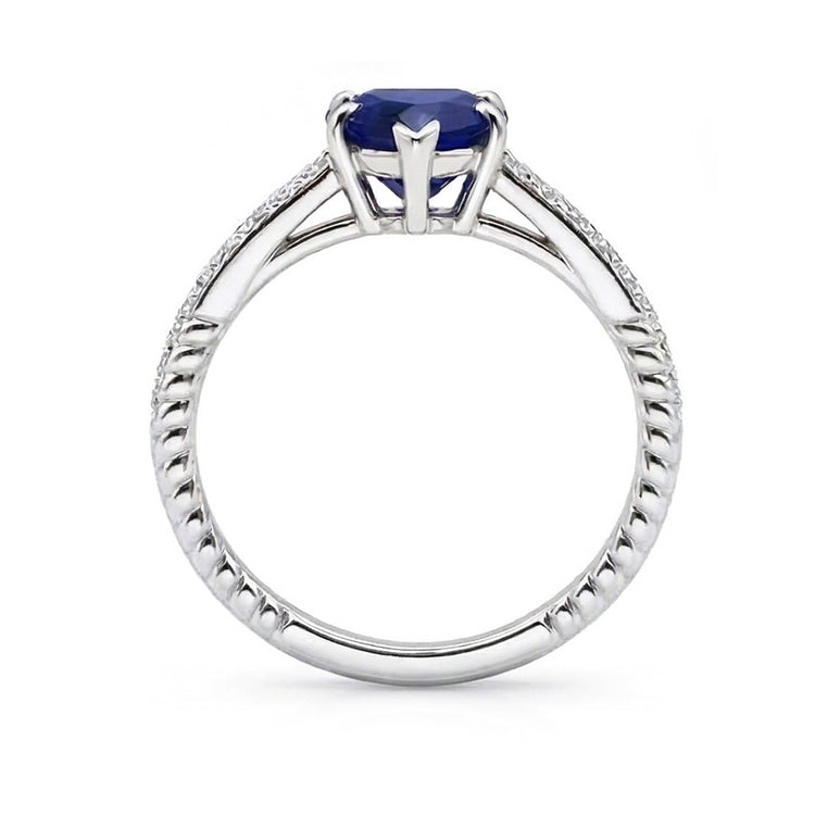 Bague solitaire en saphir de Ceylan et serti pavé. accents de diamants 2.50 carats