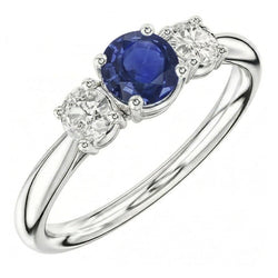 Bague trois pierres rondes en saphir bleu et diamant 1,50 carats