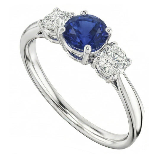 Bague trois pierres rondes en saphir bleu et diamant 1,50 carats