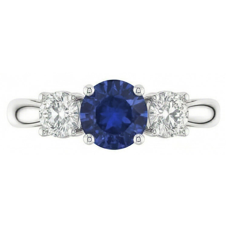 Bague trois pierres rondes en saphir bleu et diamant 1,50 carats