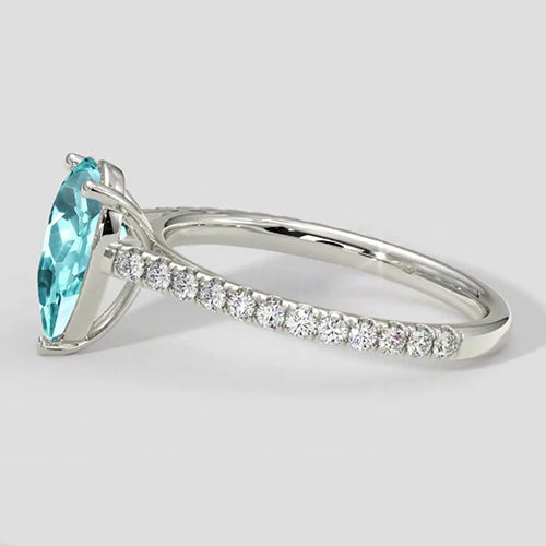 Bague élégante en forme de poire Paraiba avec pavé