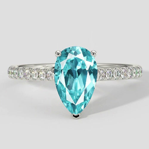 Bague élégante en forme de poire Paraiba avec pavé