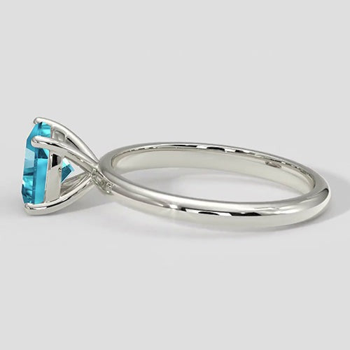 Bague en Paraiba bleu naturel taille coussin