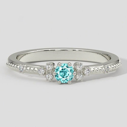 Bague millegrain tourmaline et diamants Paraiba