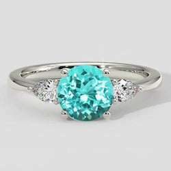 Bague trois pierres rondes en tourmaline Paraiba