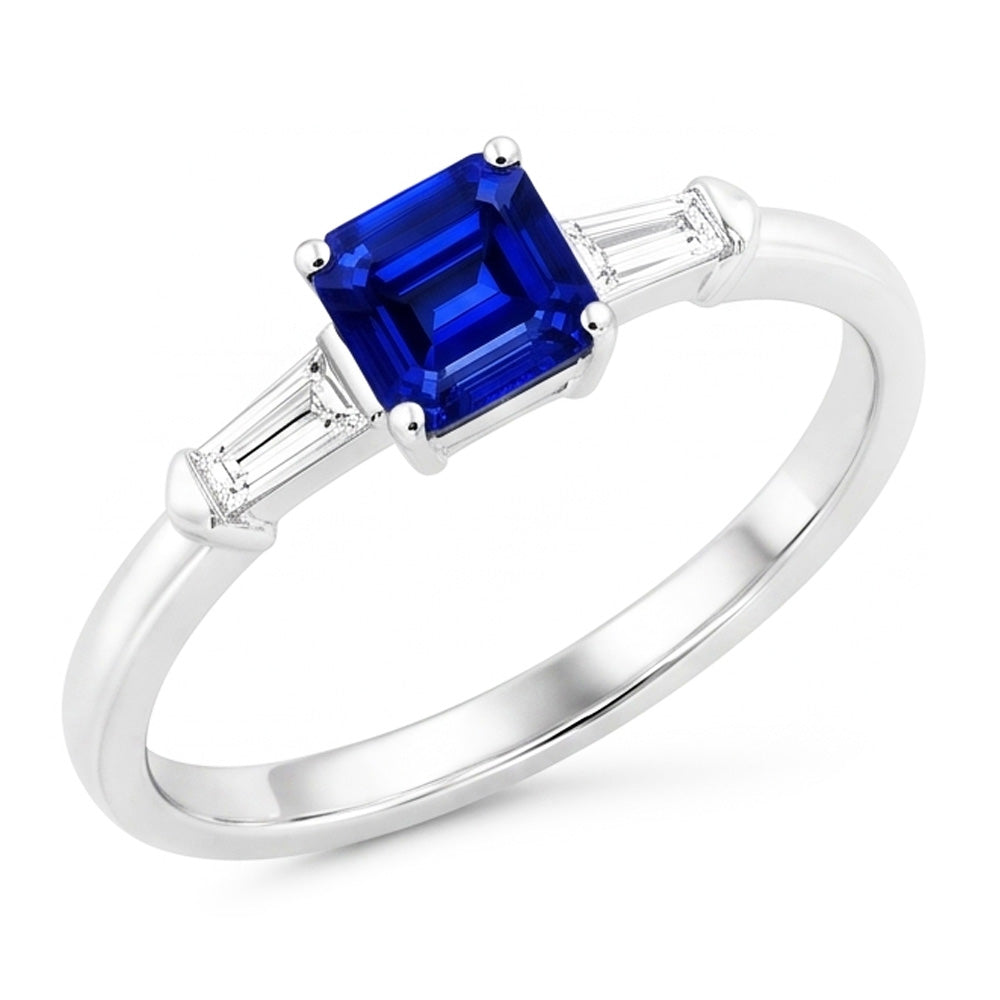 Baguette diamant trois pierres en forme d'émeraude 1.25 carats