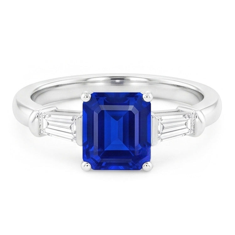 Baguette diamant trois pierres en forme d'émeraude 1.25 carats