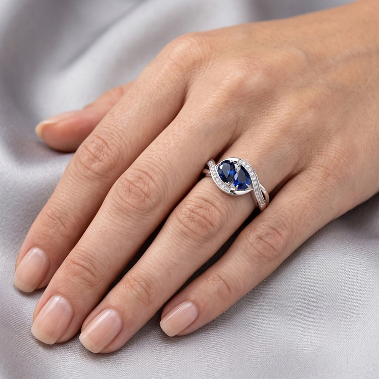 Bijoux en pierres précieuses Bague en saphir bleu poire Style torsadé 1.50 carats