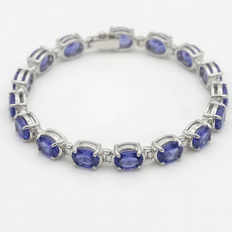 Bracelet tennis diamant saphir bleu serti de griffes bijoux 18 carats