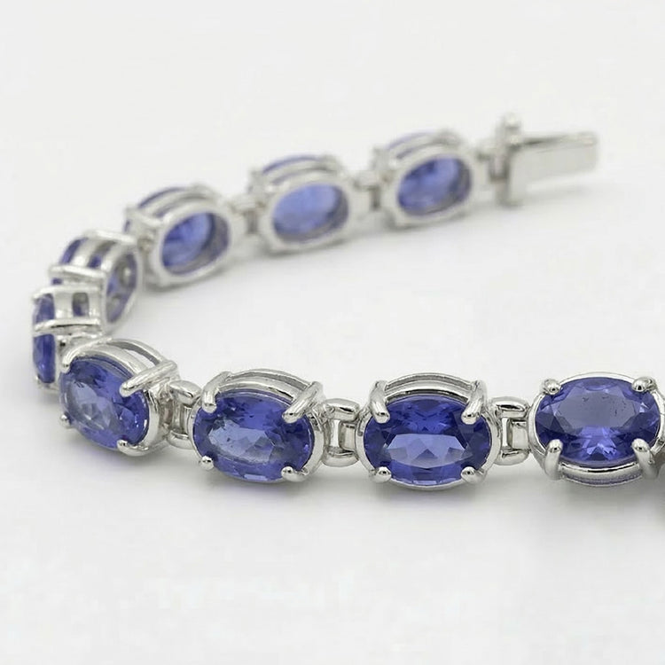 Bracelet tennis diamant saphir bleu serti de griffes bijoux 18 carats