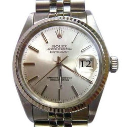 Cadran bâton argenté, lunette cannelée, montre bicolore Rolex Datejust