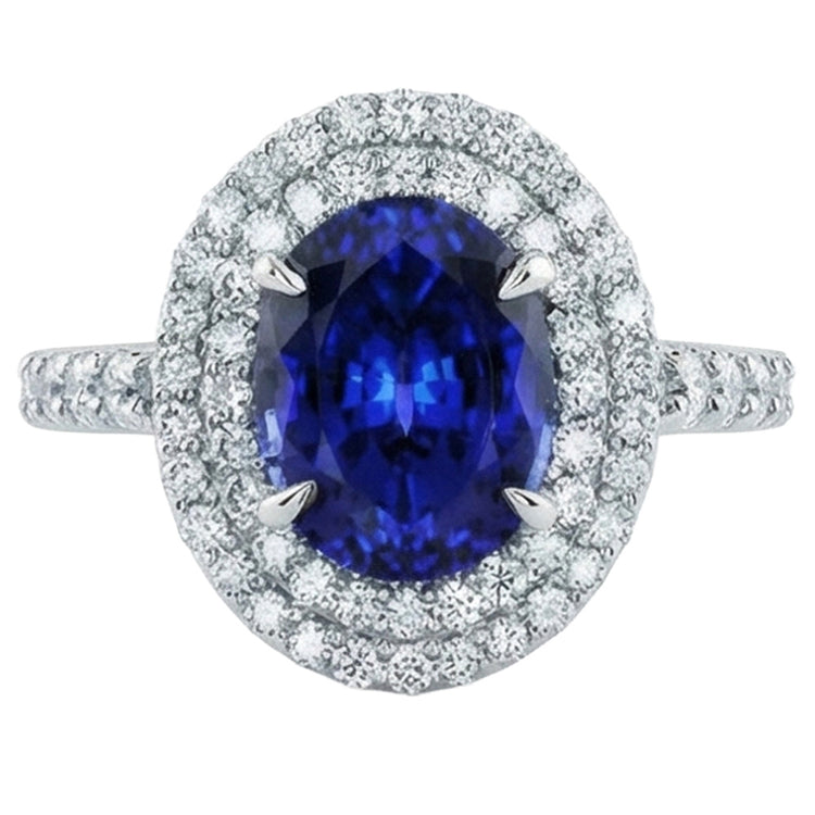 Grande bague ovale en diamant saphir bleu du Sri Lanka en or blanc de 4.55 ct 14K
