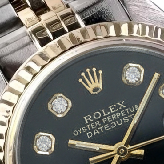 Lunette cannelée Rolex acier inoxydable et or baguette Cadran diamant Montre Datejust