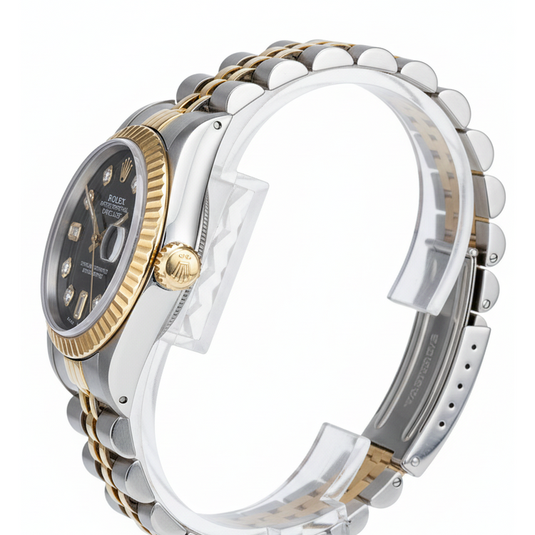 Lunette cannelée Rolex acier inoxydable et or baguette Cadran diamant Montre Datejust