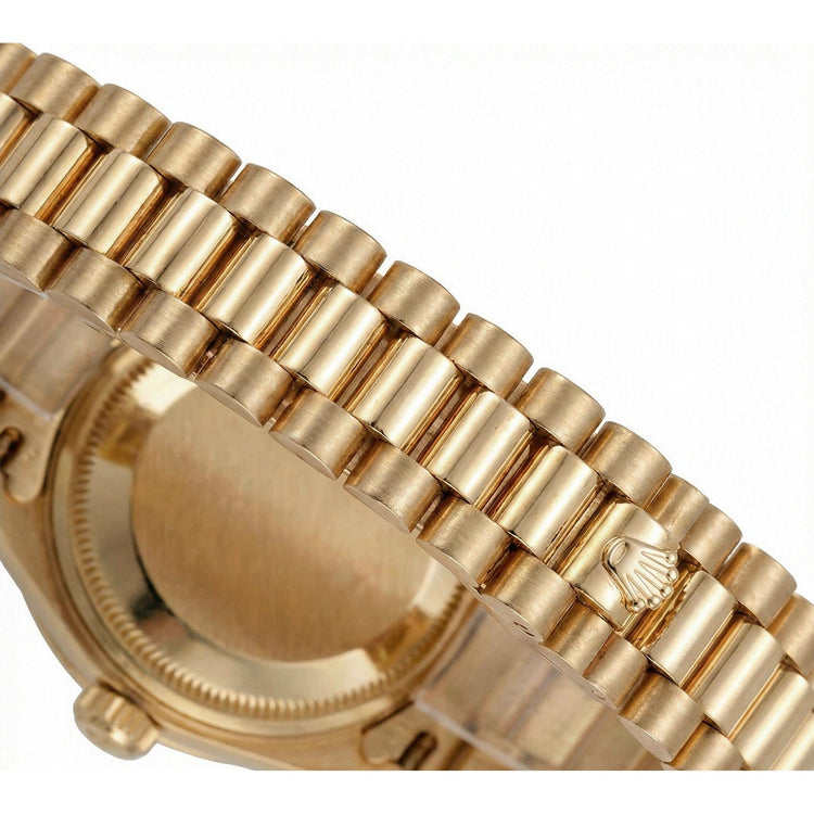 Lunette diamant Pyramide Cadran romain Rolex Datejust montre président still or jaune