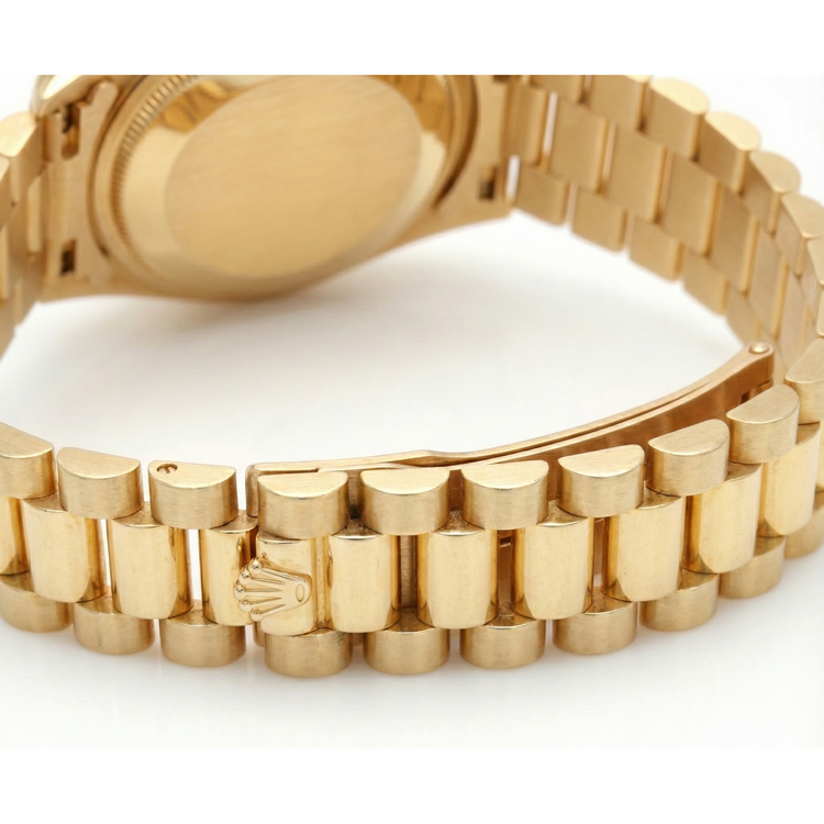 Lunette diamant cadran romain bleu Rolex or jaune président still montre Datejust