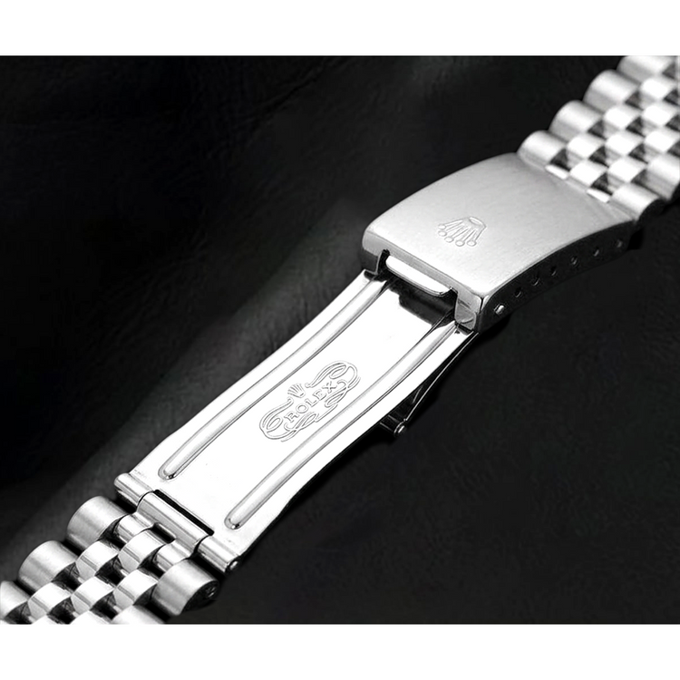 Montre Rolex Date-just 31 mm en or blanc avec lunette cannelée