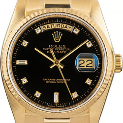 Montre Rolex Day-Date 36 mm pour homme, finition écorce, or jaune 18 carats, cadran noir