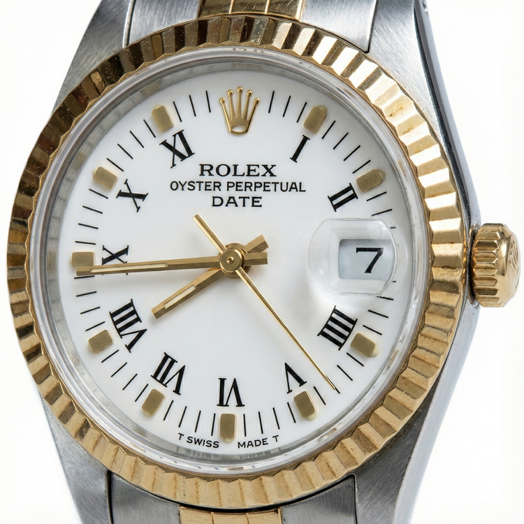 Montre avec bracelet et date en acier inoxydable et or, cadran romain blanc, lunette cannelée