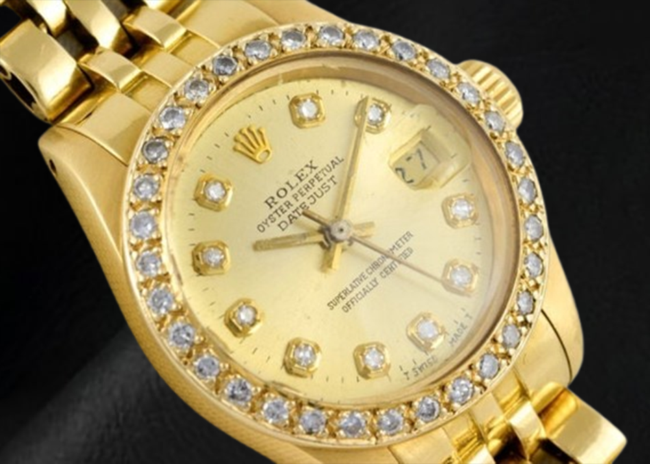 Montre Rolex Datejust 26 mm avec cadran diamant champagne President en or jaune