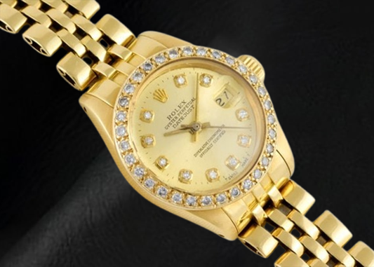 Montre Rolex Datejust 26 mm avec cadran diamant champagne President en or jaune