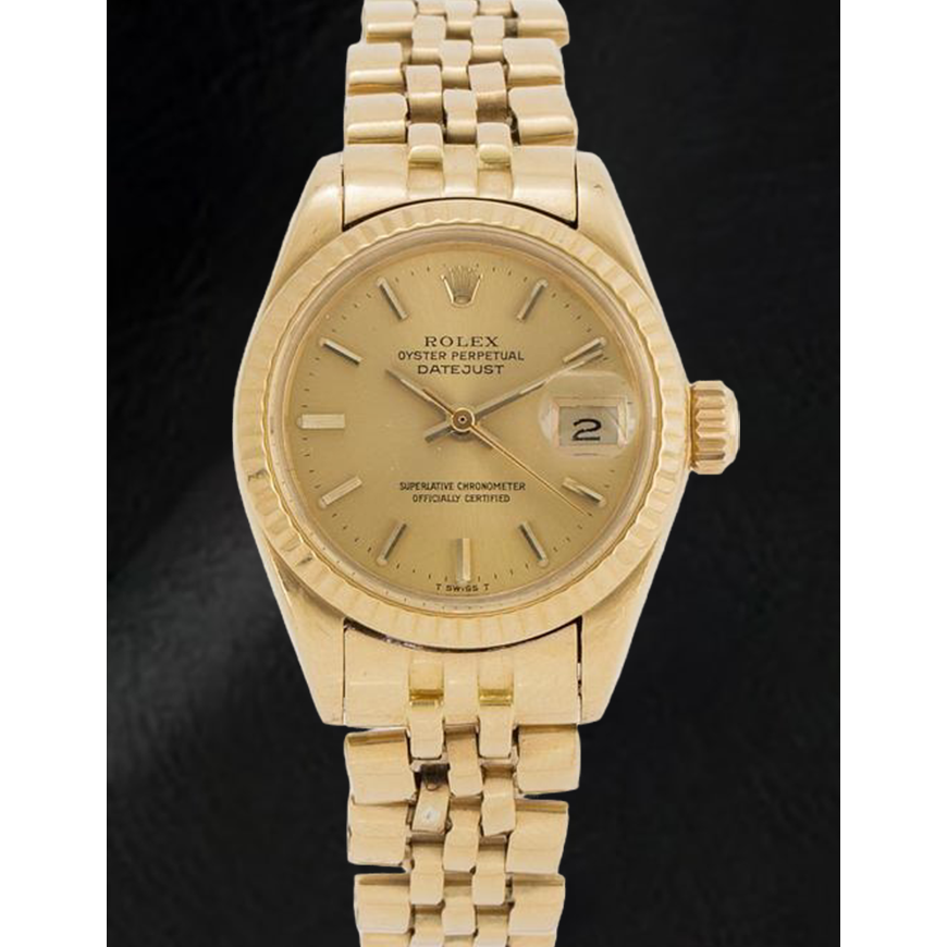 Montre Rolex Datejust 26 mm pour femme avec cadran bâton de champagne en or jaune