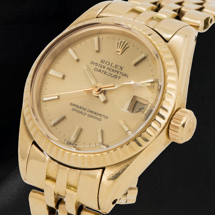 Montre Rolex Datejust 26 mm pour femme avec cadran bâton de champagne en or jaune