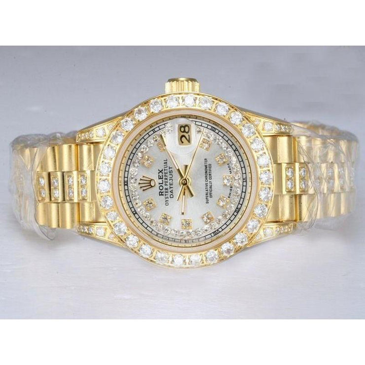 Montre Rolex Datejust Iced Out Diamond Lady bracelet en or jaune