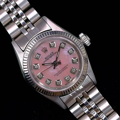 Montre Rolex Datejust en acier inoxydable avec lunette cannelée et cadran diamant