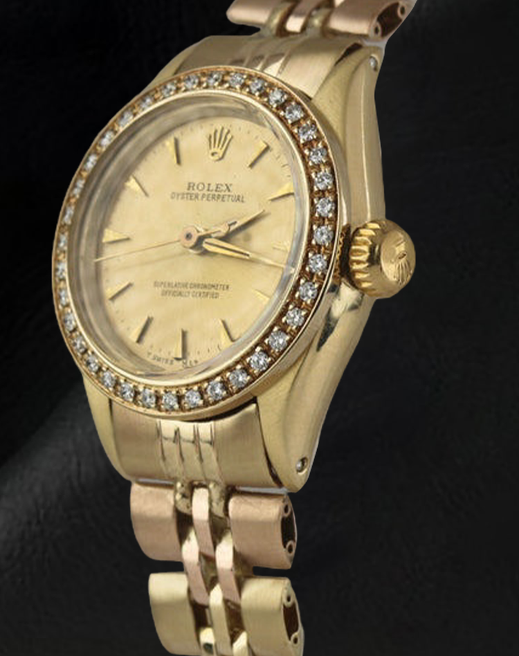 Montre Rolex Oyster Perpetual pour femme avec lunette en diamant et or jaune