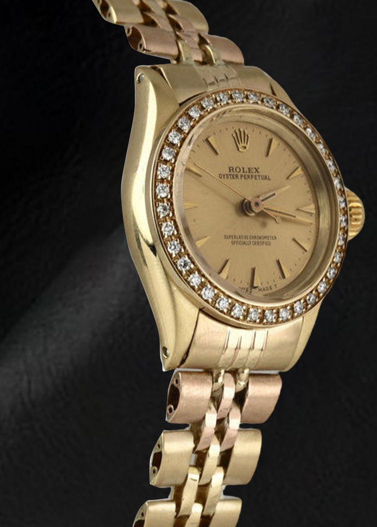 Montre Rolex Oyster Perpetual pour femme avec lunette en diamant et or jaune