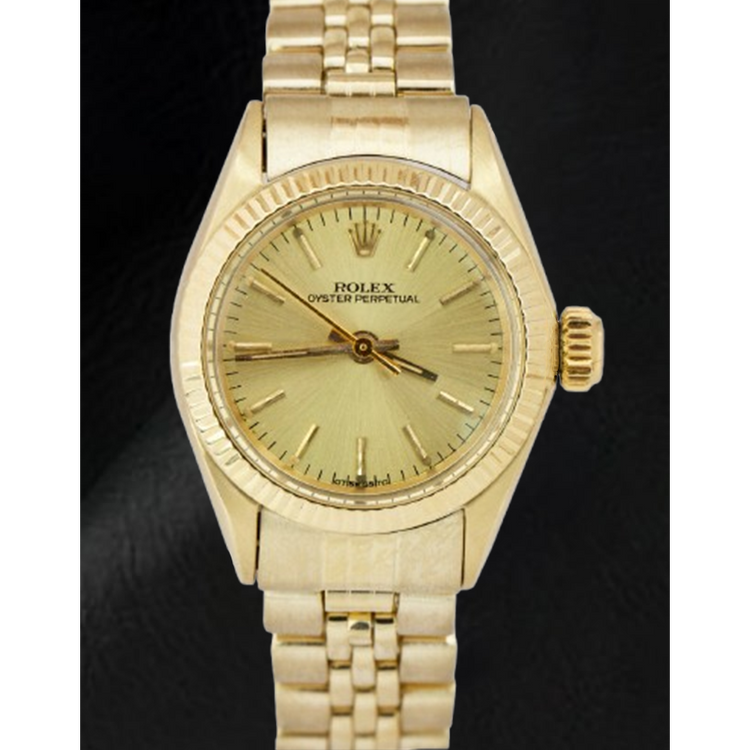 Montre Rolex 24 mm avec cadran champagne en or jaune