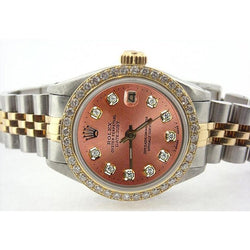 Montre Rolex Date-Just pour femme avec cadran saumon et lunette diamantée