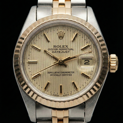 Montre Rolex Date Just pour femme avec cadran bicolore et bracelet jubilé
