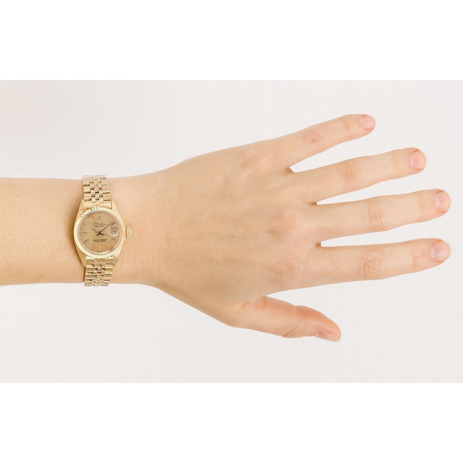 Montre Rolex Datejust 26 mm pour femme avec cadran champagne et or jaune P4