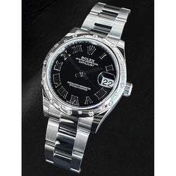 Montre Rolex Datejust 31 mm en acier inoxydable avec diamants romains noirs pour femme