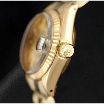 Montre Rolex Datejust 26 mm en or jaune pour femme
