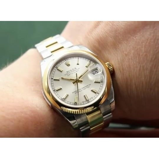 Montre Rolex Datejust de taille moyenne 31 mm acier inoxydable et bracelet en or jaune lisse