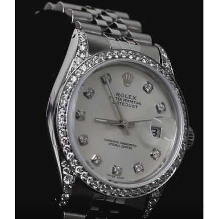 Montre Rolex Datejust de taille moyenne avec lunette et cadran 