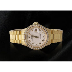 Montre Rolex Datejust pour femme avec lunette en diamant et bracelet Oyster en or jaune
