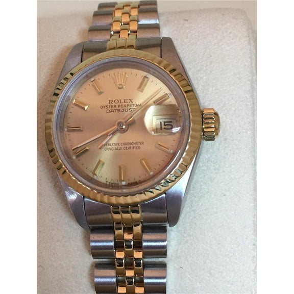 Montre Rolex Datejust pour femme, cadran bâton, lunette cannelée, bicolore