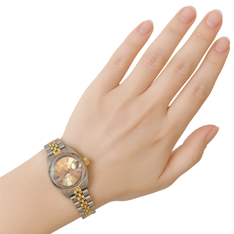 Montre Rolex Datejust pour femme, cadran bâton, lunette cannelée, bicolore