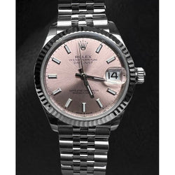 Montre Rolex Datejust saumon à cadran lumineux en acier inoxydable de 31 mm