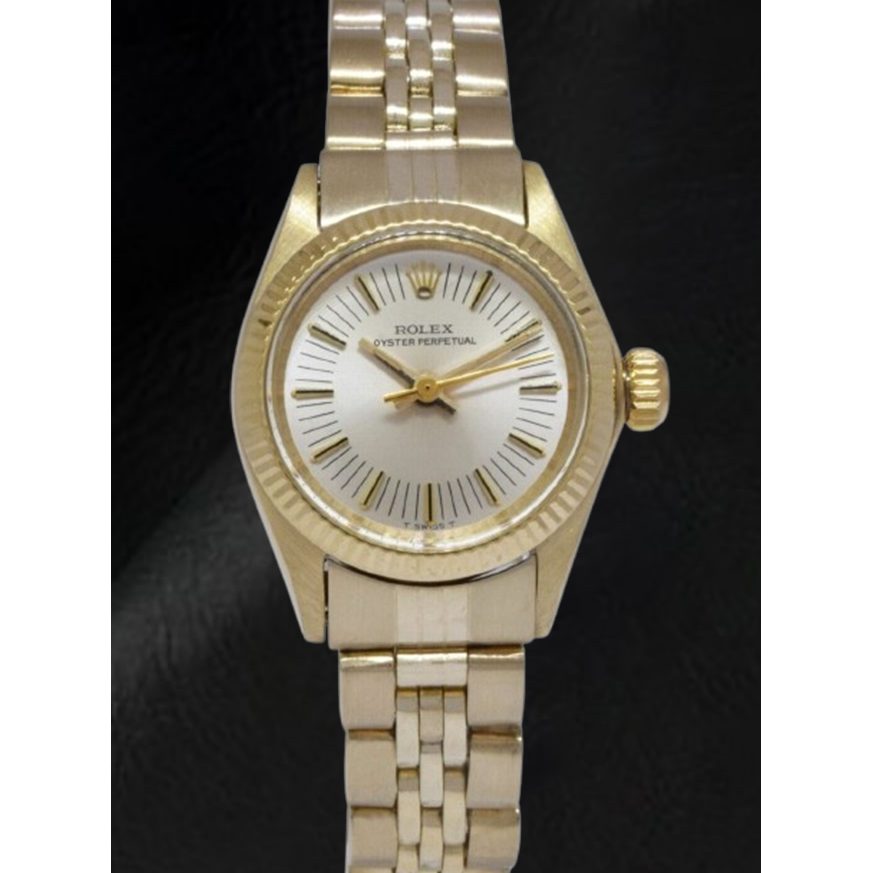 Montre Rolex Oyster Perpetual 24 mm avec cadran argenté et or jaune
