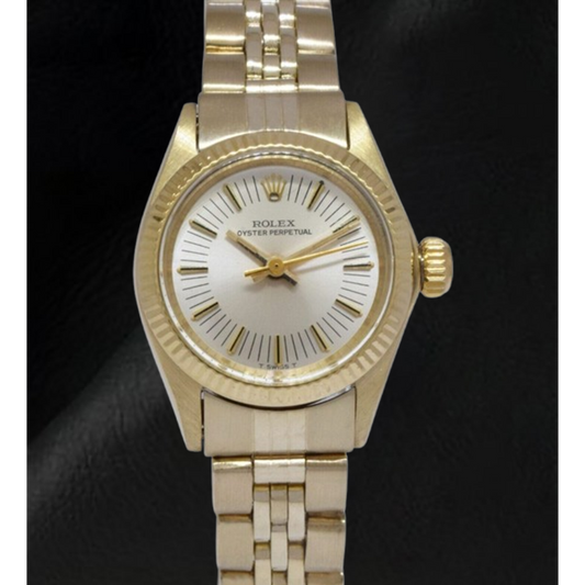 Montre Rolex Oyster Perpetual 24 mm avec cadran blanc et or jaune