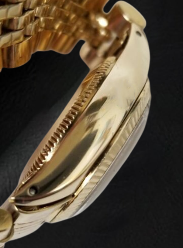Montre Rolex Oyster Perpetual 24 mm avec cadran bâton de champagne en or jaune