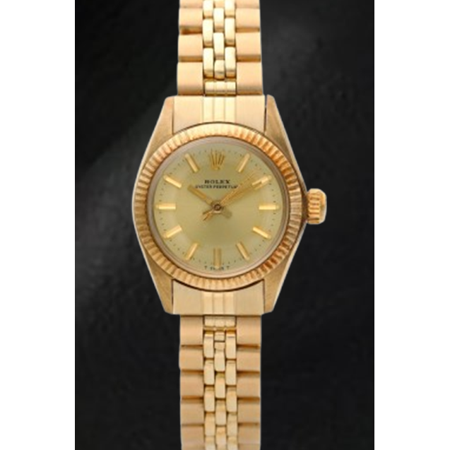 Montre Rolex Oyster Perpetual 24 mm avec cadran champagne et or jaune