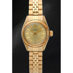 Montre Rolex Oyster Perpetual 24 mm avec cadran champagne et or jaune