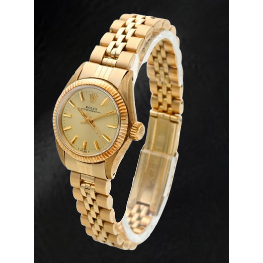 Montre Rolex Oyster Perpetual 24 mm avec cadran champagne et or jaune